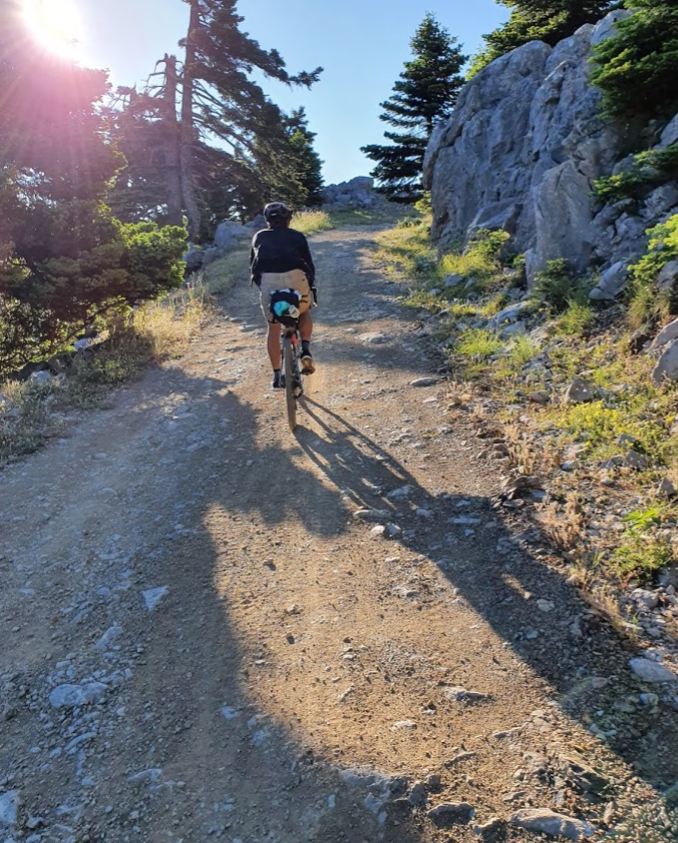 Gravel Cyclist Climbing 